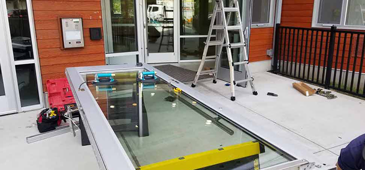storefront door glass replacement Mayflower Village